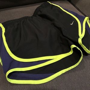 Nike running shorts black, neon green and purple